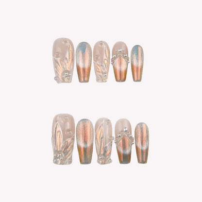 Elegant Nude Nails with Metallic Accents