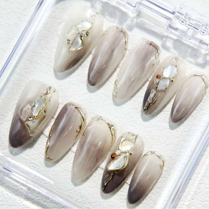 Elegant Marble Nails with Shell Accents