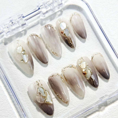 Elegant Marble Nails with Shell Accents