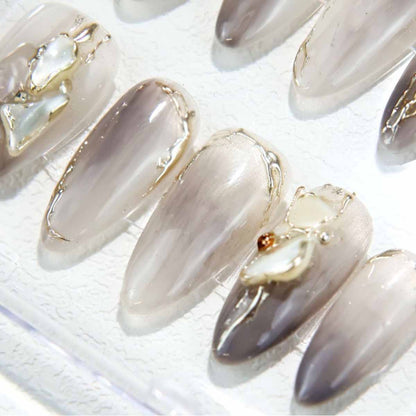 Elegant Marble Nails with Shell Accents