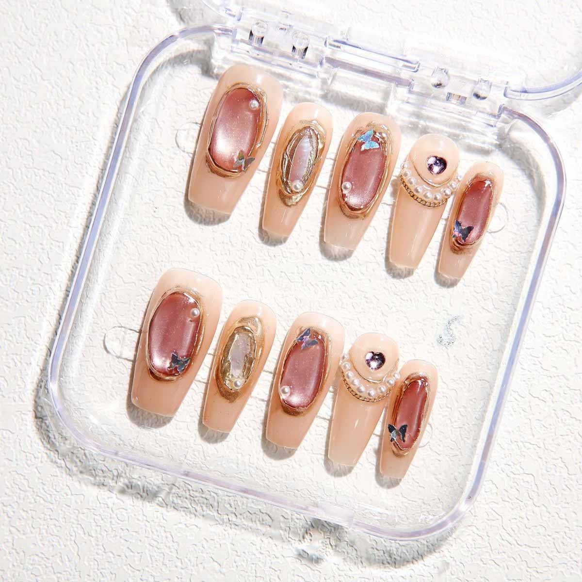 Elegant Nude - toned Nails with Delicate Embellishments