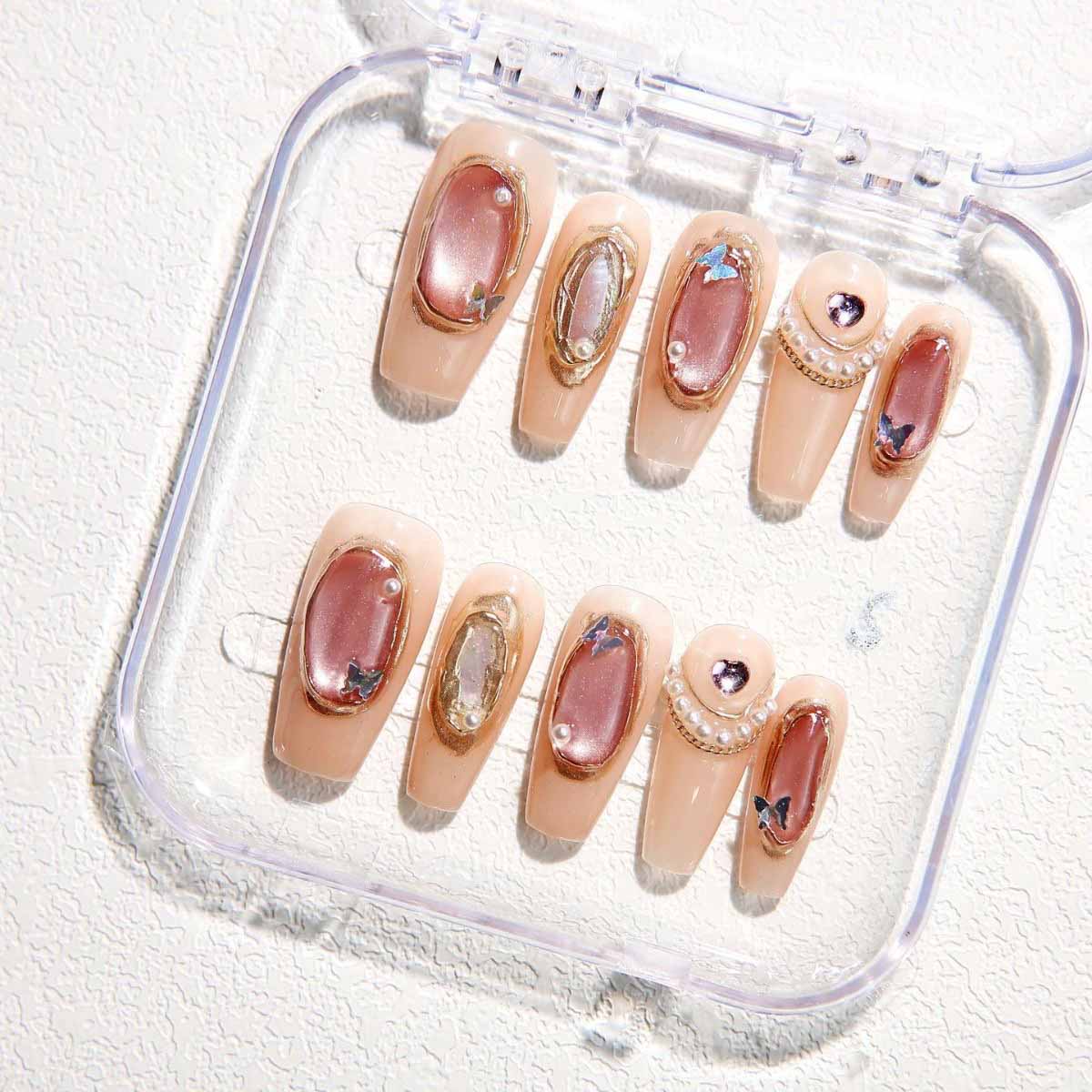 Elegant Nude - toned Nails with Delicate Embellishments