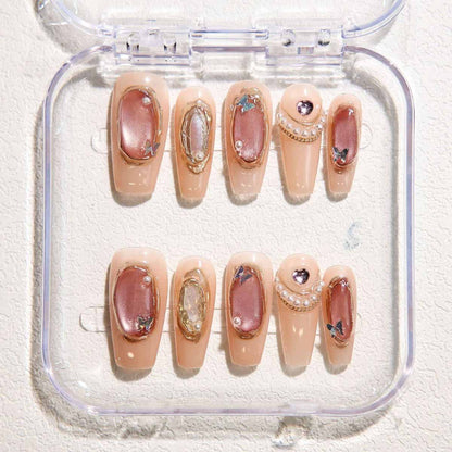 Elegant Nude - toned Nails with Delicate Embellishments