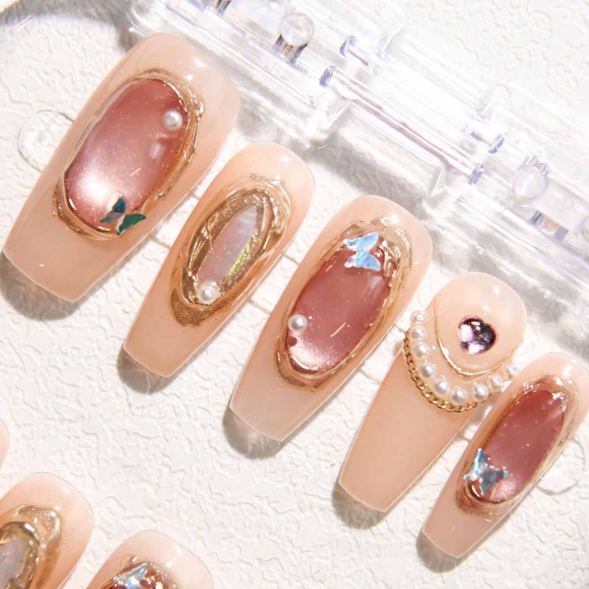 Elegant Nude - toned Nails with Delicate Embellishments