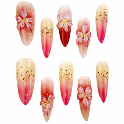 Elegant Ombre Nails with Blossom Embellishments