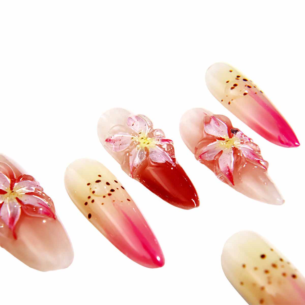 Elegant Ombre Nails with Blossom Embellishments