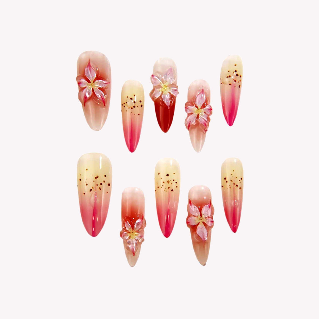 Elegant Ombre Nails with Blossom Embellishments