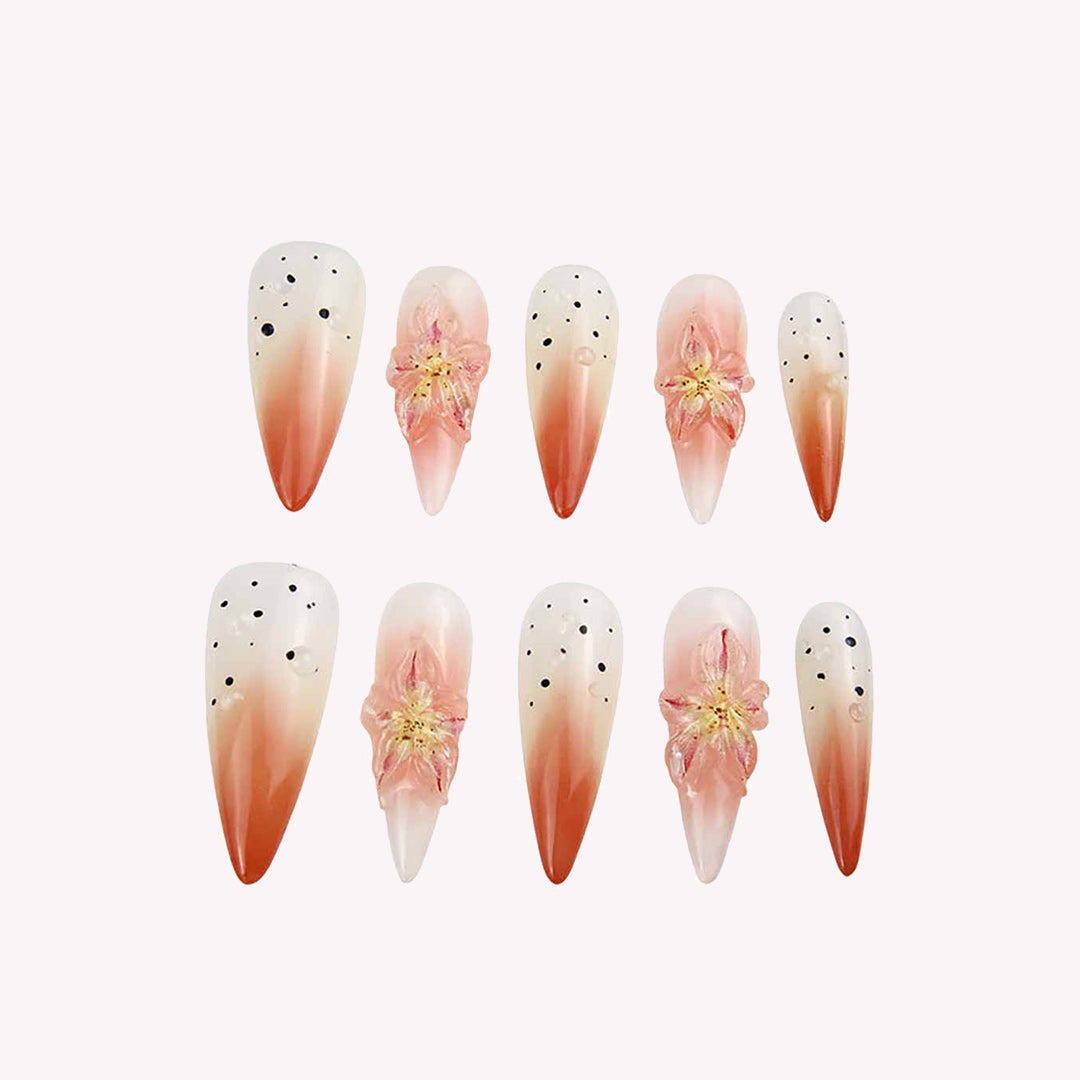 Elegant Ombre Nails with Floral Embellishments