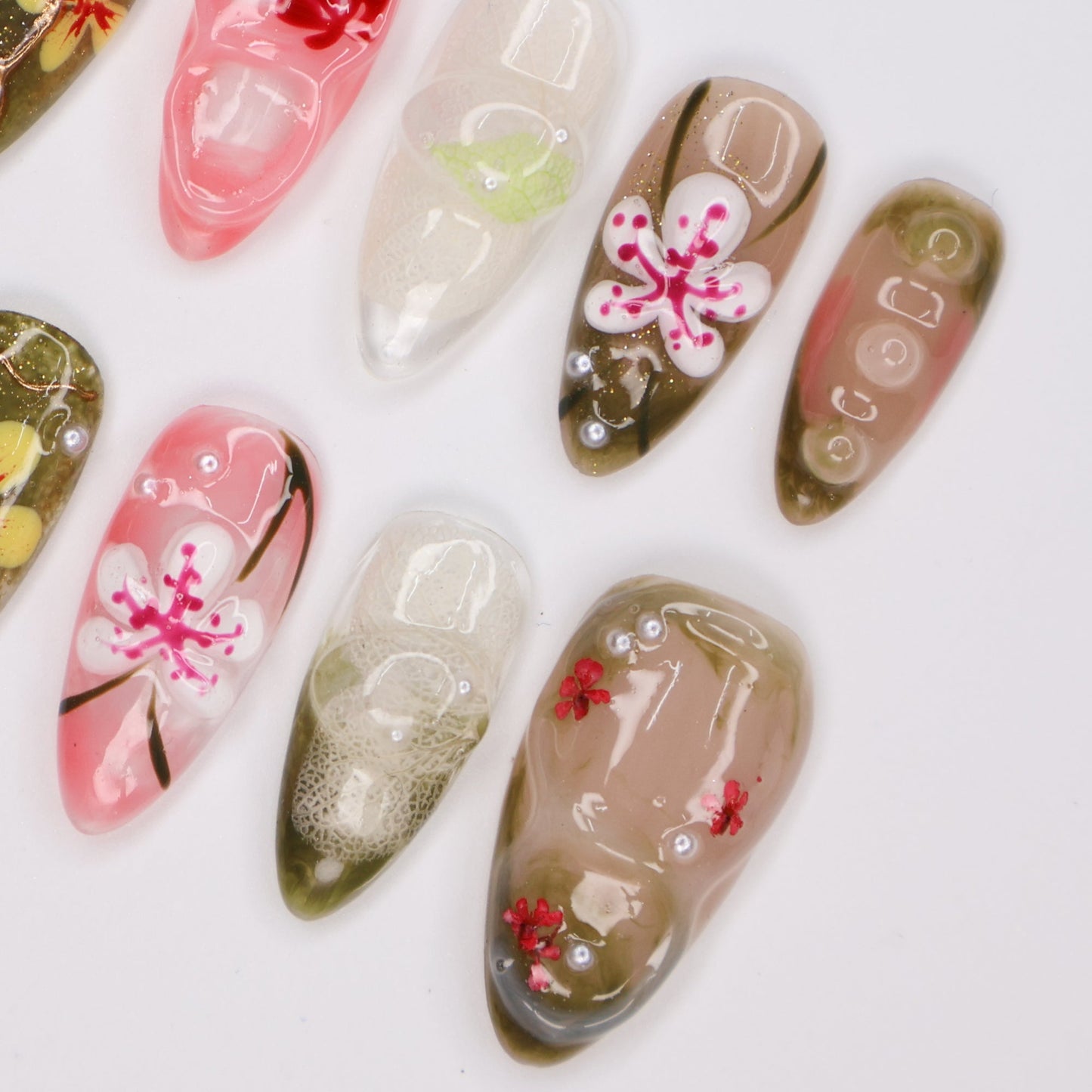 Handmade Tropical Floral Press-On Nails – Spring Collection-  earthy green, soft pink, and translucent tones with 3D flowers, pearl accents, and shimmer. Perfect for vacations, beach days, or as a unique gift for her.