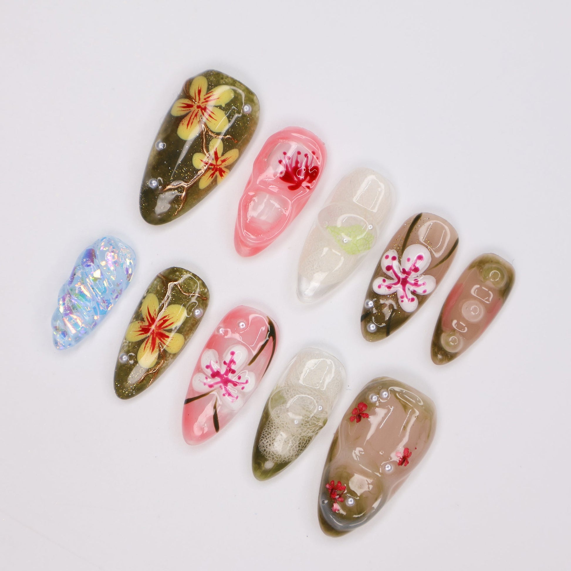 Handmade Tropical Floral Press-On Nails – Spring Collection-  earthy green, soft pink, and translucent tones with 3D flowers, pearl accents, and shimmer. Perfect for vacations, beach days, or as a unique gift for her.