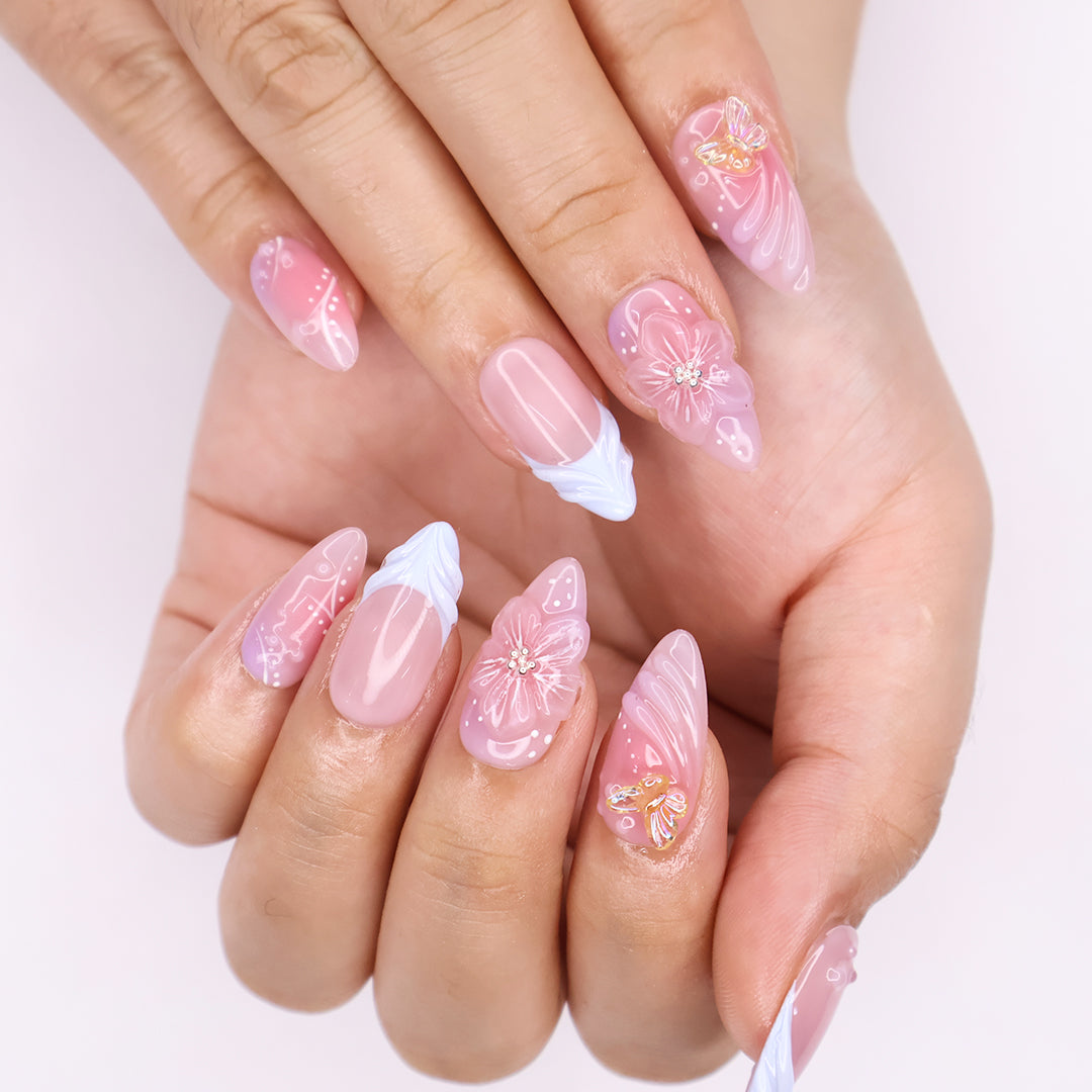 Serenity Garden - Spring Collection - Handmade Butterfly & Flower Press-On Nails – soft pink tones with delicate 3D floral accents, butterflies, and blue French tips. Perfect for birthdays, weddings, vacations, or as a beautiful gift for her.