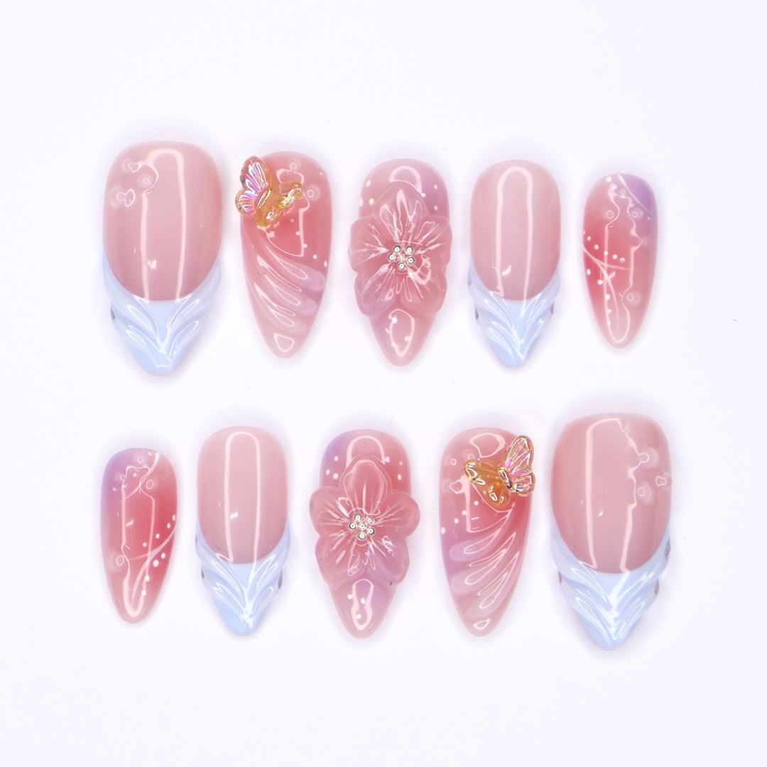 Serenity Garden - Spring Collection - Handmade Butterfly & Flower Press-On Nails – soft pink tones with delicate 3D floral accents, butterflies, and blue French tips. Perfect for birthdays, weddings, vacations, or as a beautiful gift for her.