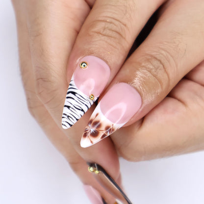 Handmade Tortoise & Zebra Press-On Nails – Fall Collection nude pink tones with tortoiseshell accents, zebra stripes, and delicate 3D floral designs. Perfect for everyday wear, events, holiday, vacation or as a stylish gift for her