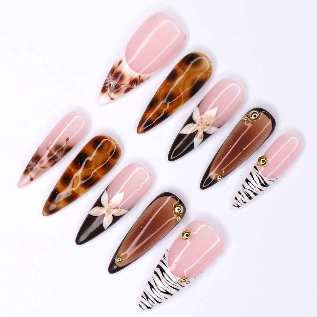 Handmade Tortoise & Zebra Press-On Nails – Fall Collection nude pink tones with tortoiseshell accents, zebra stripes, and delicate 3D floral designs. Perfect for everyday wear, events, holiday, vacation or as a stylish gift for her