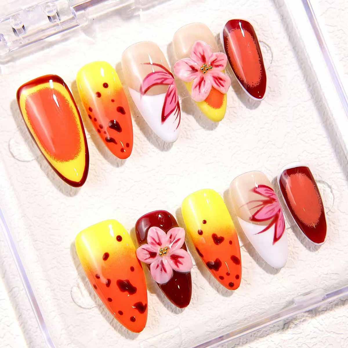 Vibrant Nail Art with Gradient and Floral Designs